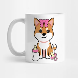 cute baby orange dog wears a pink ribbon Mug